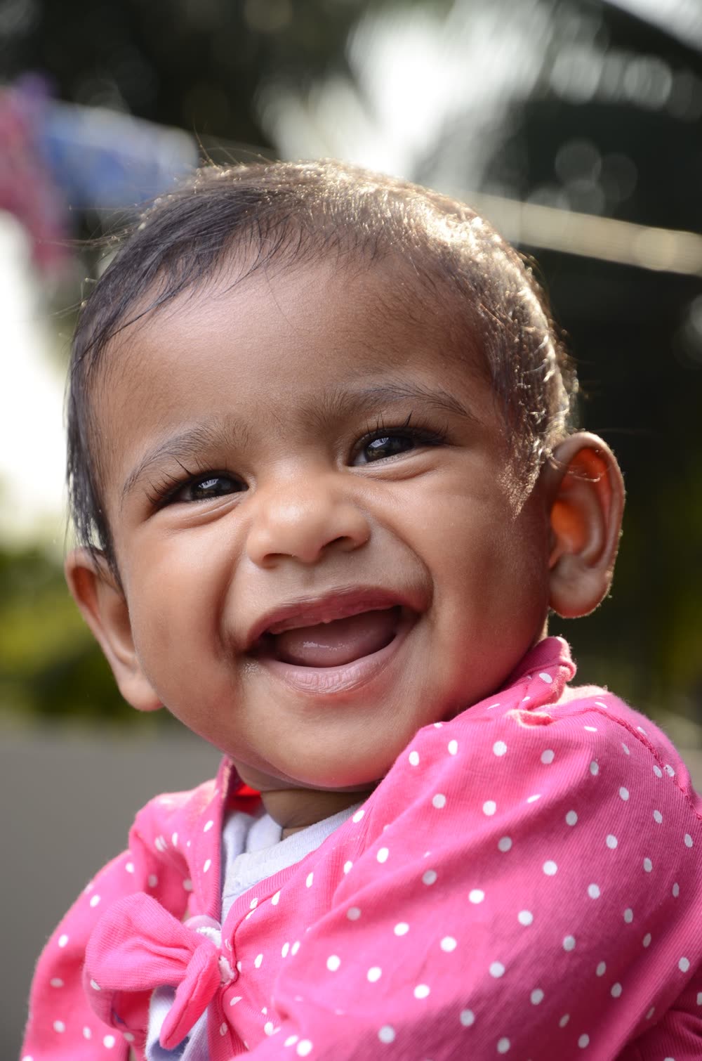 A happy, healthy baby laughing