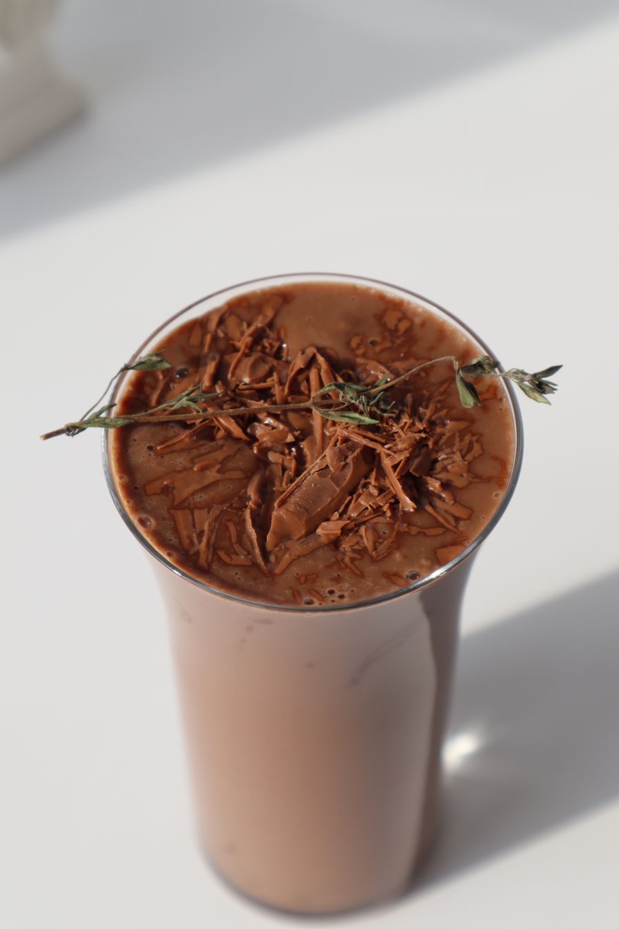 A glass of chocolate drink