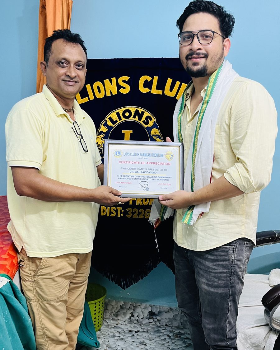Dr. Gaurav Das receiving a certificate of appreciation from the Lions Club of Karimganj Frontline